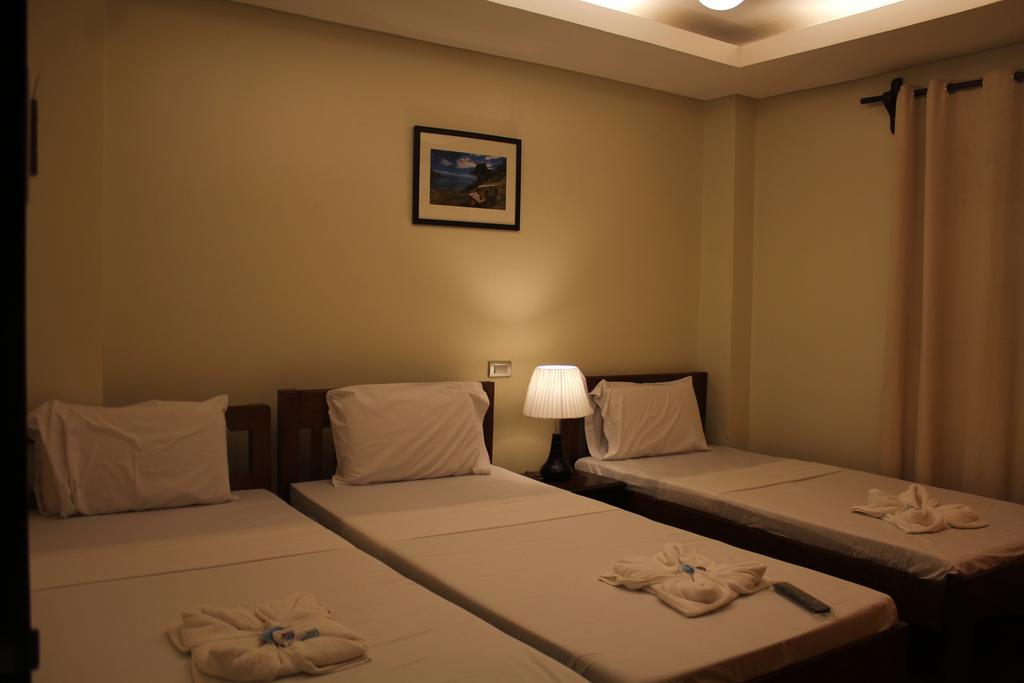 Aqua Travel Lodge Эль-Нидо Экстерьер фото